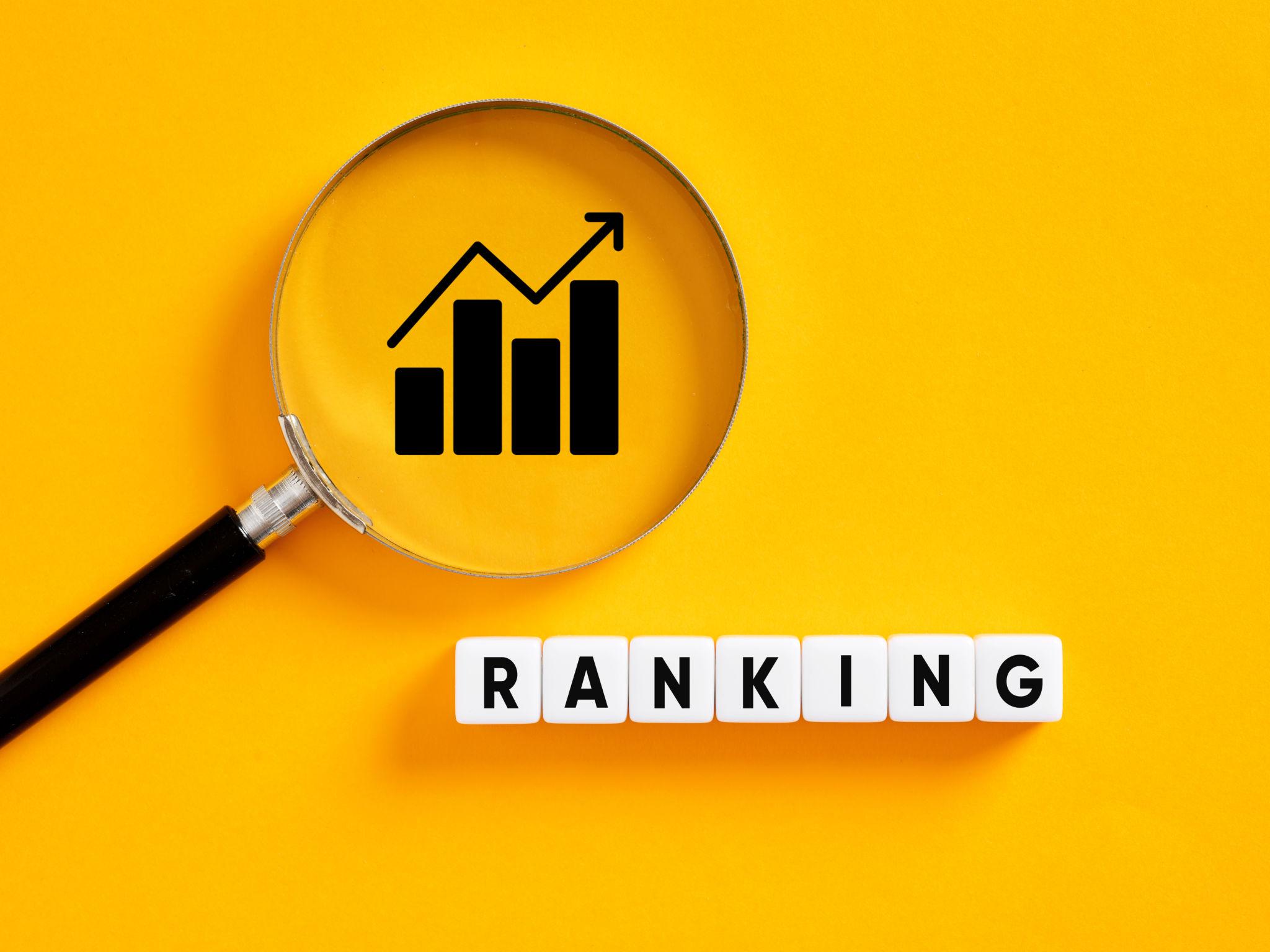 SEO ranking growth concept with magnifying glass highlighting upward analytics graph